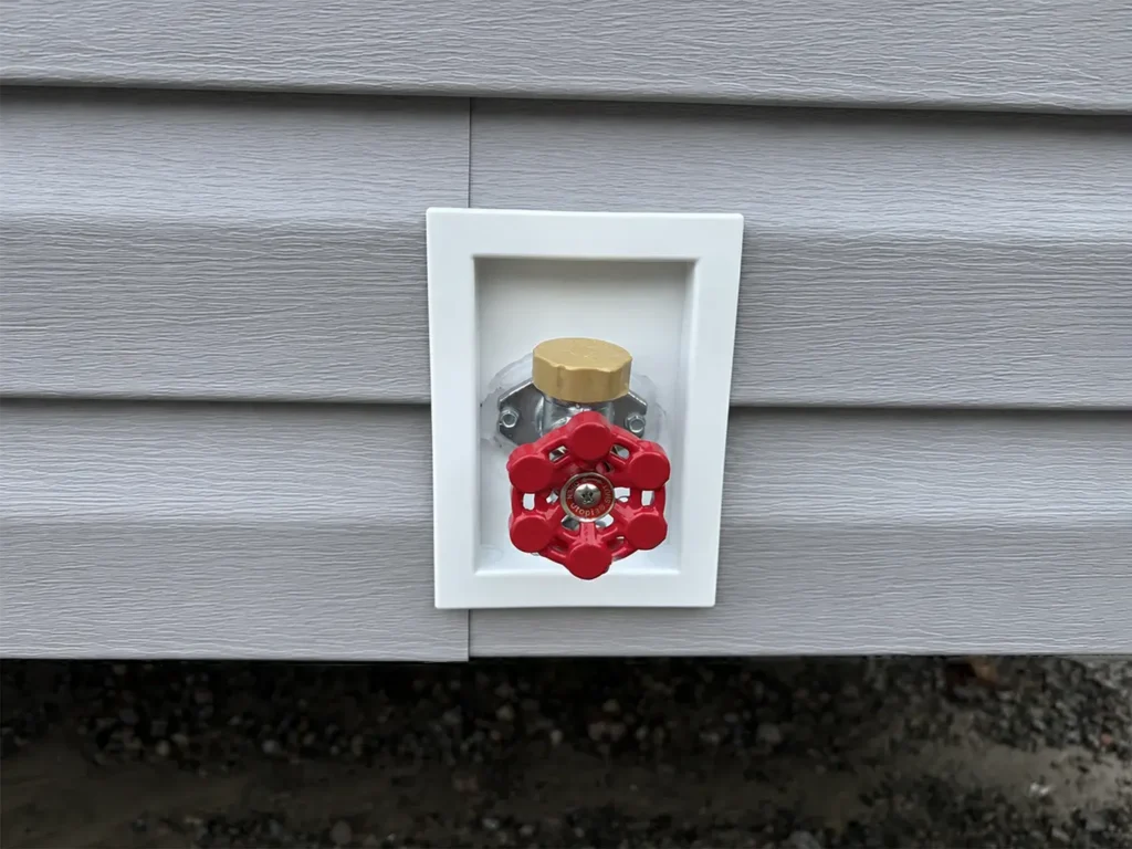 Exterior faucet on front Image